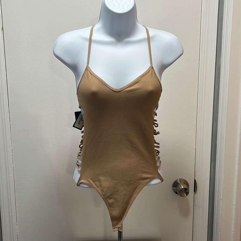 Tan bebe body suit with side cut outs